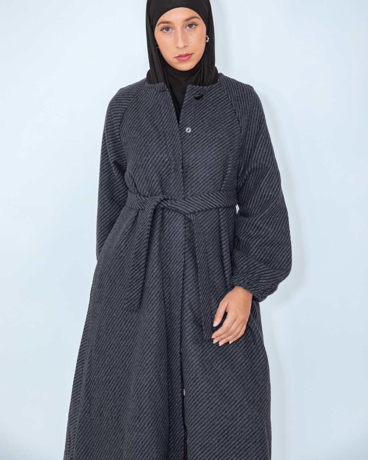 manteau long noir structuré Élégance intemporelle