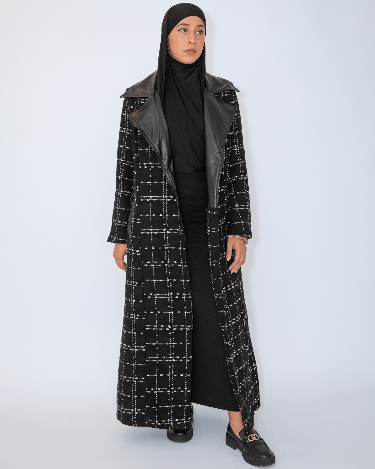 manteau long noir tweed et simili cuir Élégance structurée